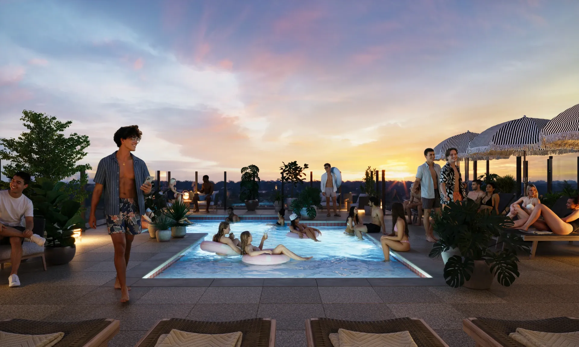 People relax in and around a rooftop pool at sunset at UMich Off-Campus Housing, with some swimming and others lounging nearby. The scene includes tropical plants, stylish chairs, and a colorful sky in the background.