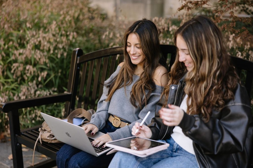 Two UMich students studying together in the Law Quad, located right across from central campus. 