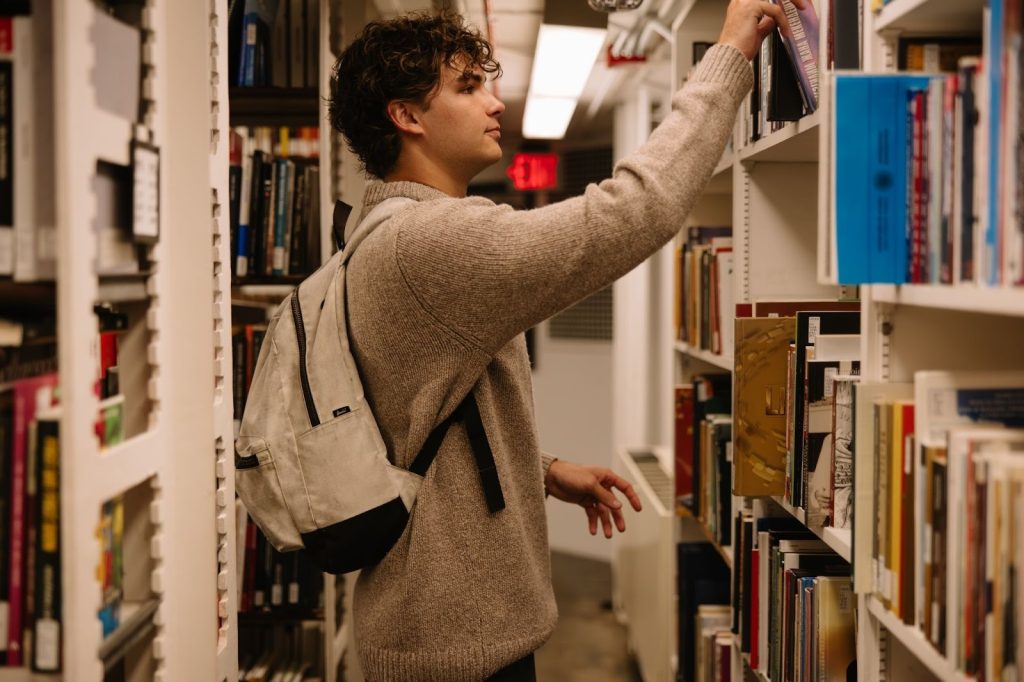 UMich student studying at Hatcher Graduate Library located right off the Diag.