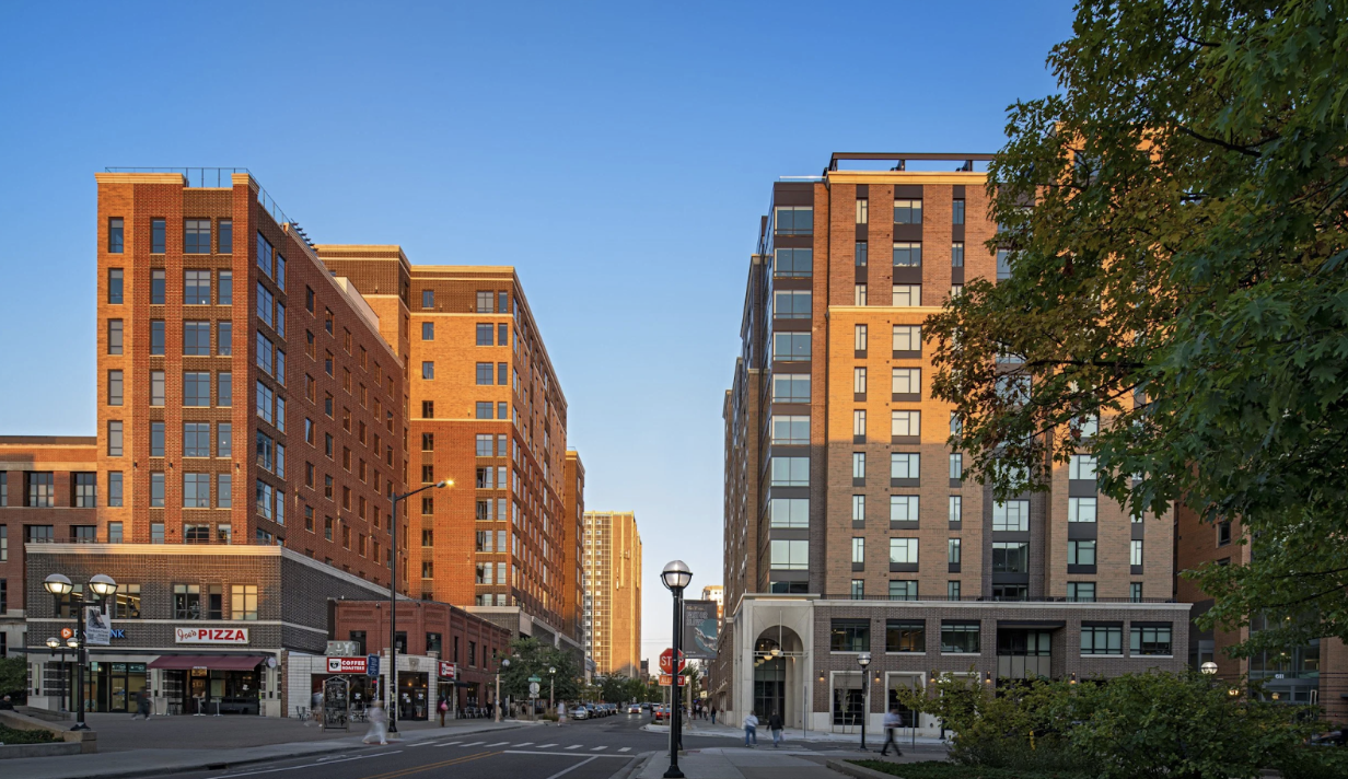 Vic Village South student apartments in Ann Arbor near the University of Michigan, featuring modern brick exterior and walkable location.