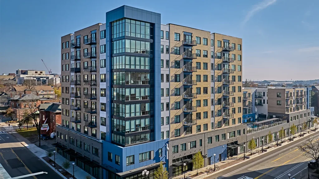 The Standard at Ann Arbor high-rise student apartments on Main Street, featuring modern balconies and luxury Ann Arbor student housing near the University of Michigan campus.