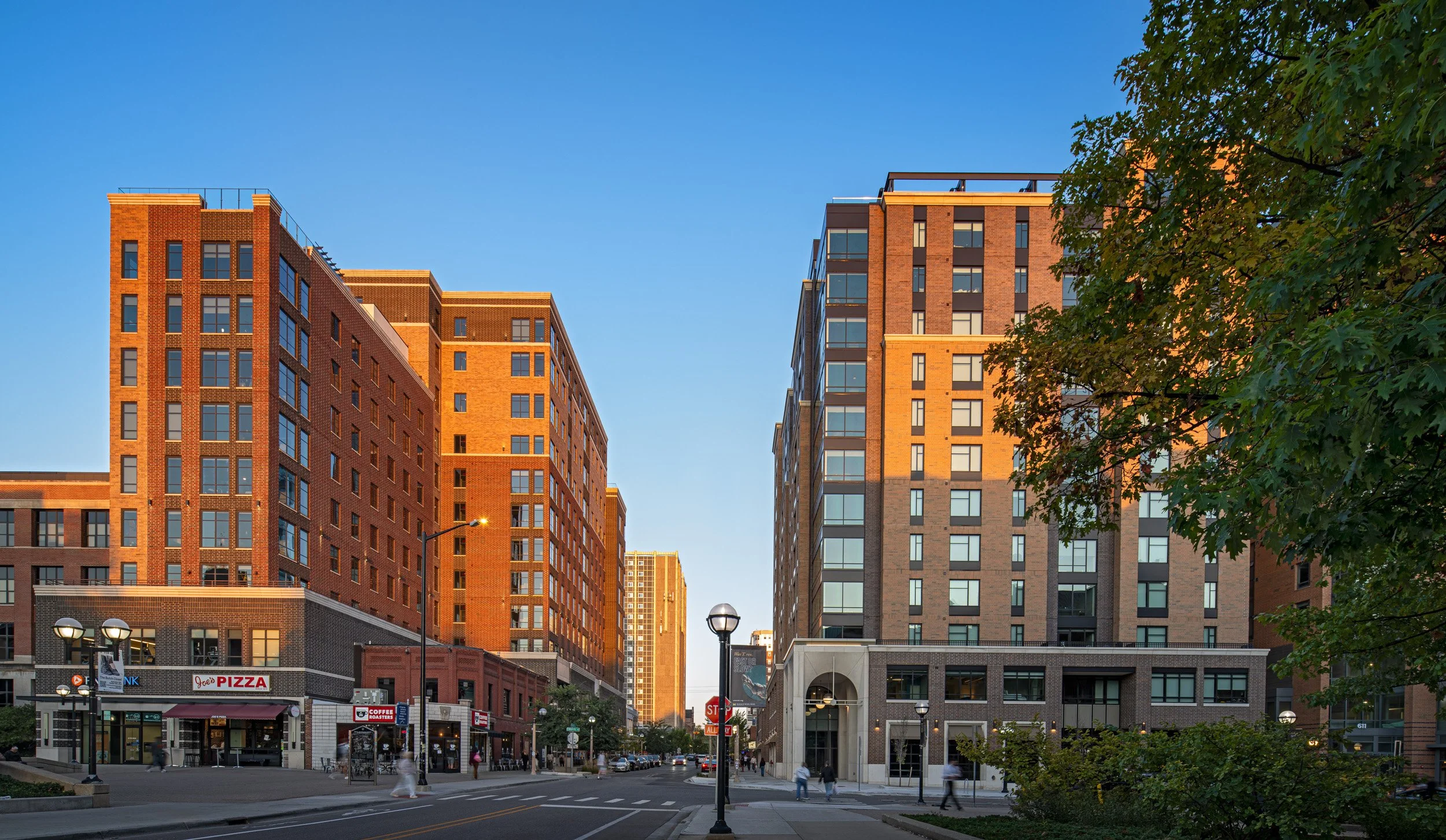 Vic Village South student apartments in Ann Arbor near the University of Michigan, featuring modern brick exterior and walkable location.