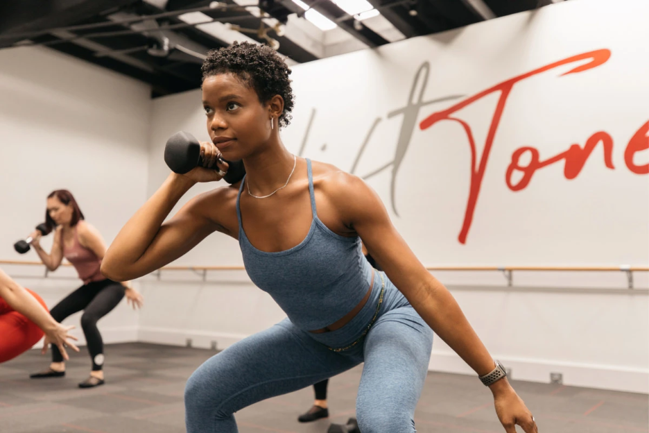 UMich student does a workout at Pure Barre Downtown Ann Arbor. 
