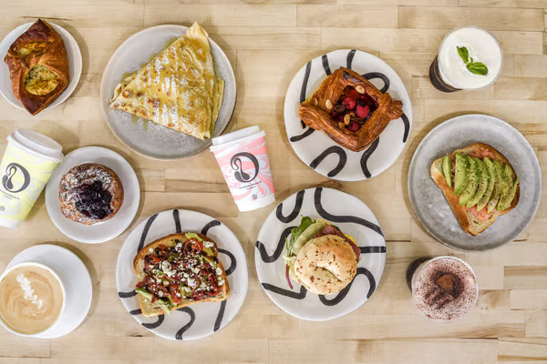 Selection of toast, pastries and coffee served at Drip House, a small café with a variety of brunch dishes.