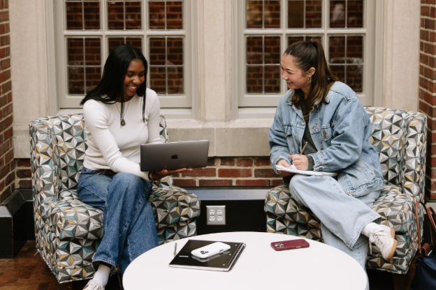 Two UMich students studying in the Michigan Union, a building located on Central Campus.