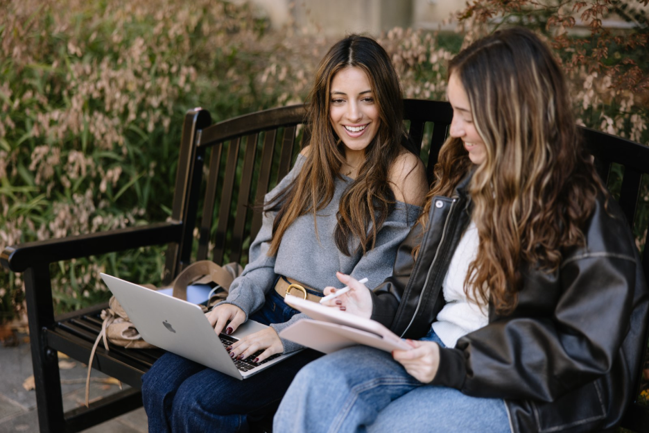 University of Michigan students research on their laptops on campus in Ann Arbor, MI.