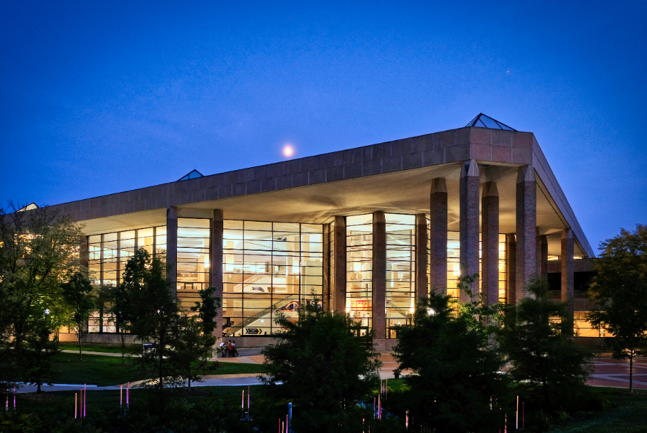 Outside, nighttime view of the Duderstadt Center on North Campus. 