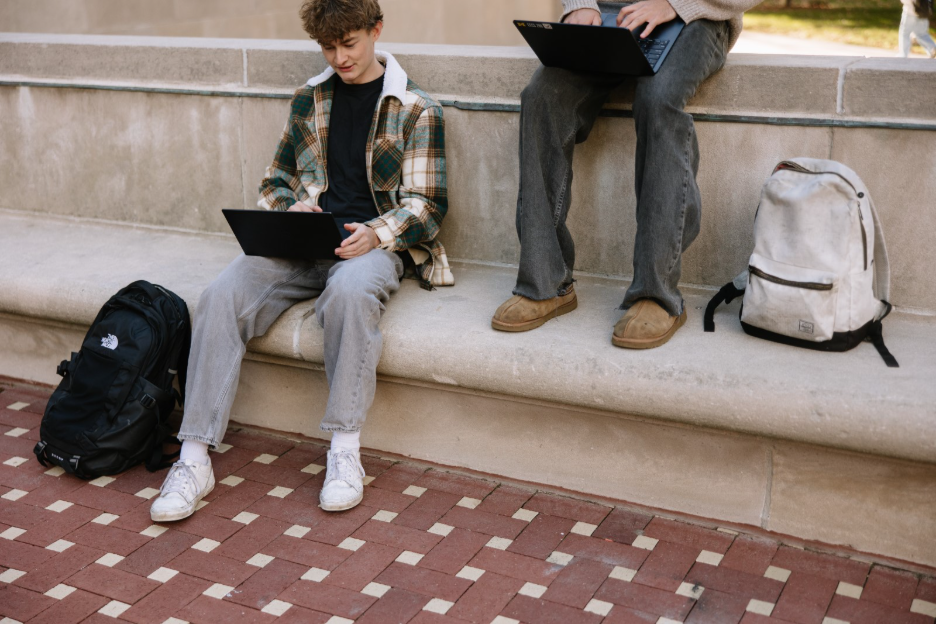 University of Michigan students do work on their laptops on-campus in Ann Arbor. 