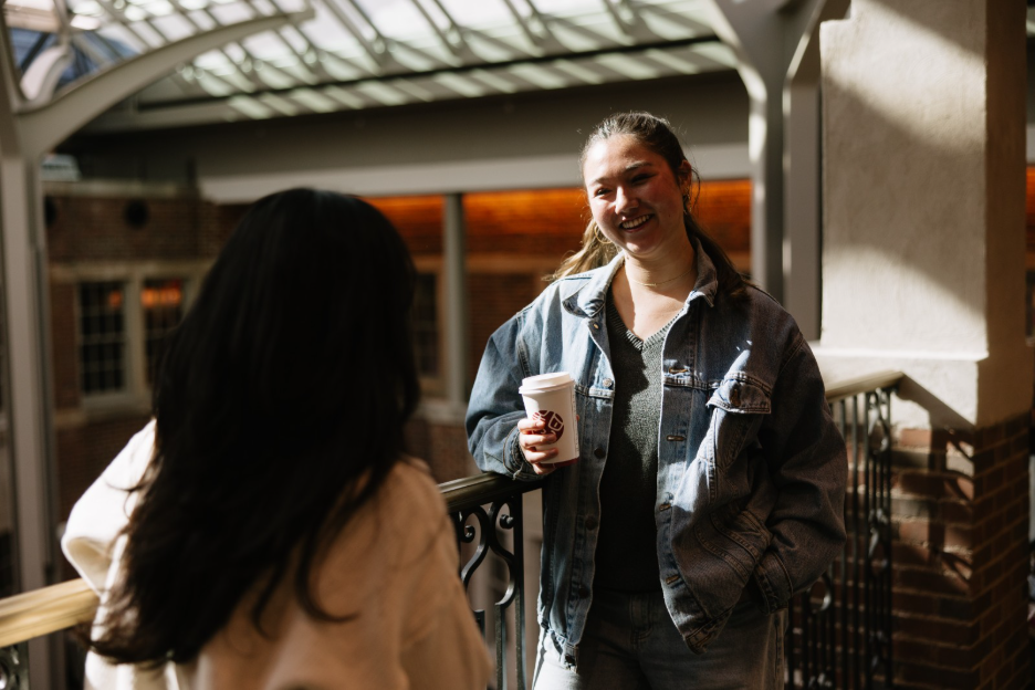 University of Michigan student studying with coffee in Ann Arbor. 