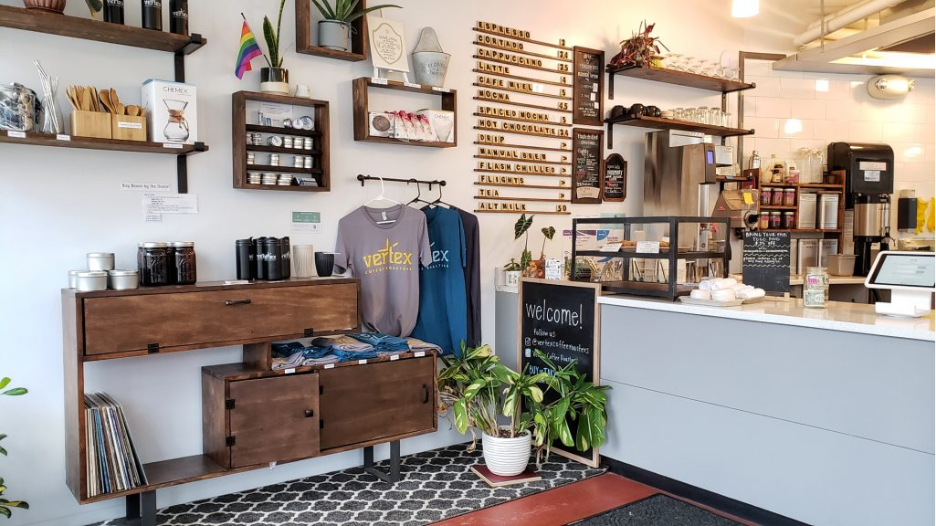 Coffee and seating area inside Vertex Coffee Roasters in Ann Arbor.