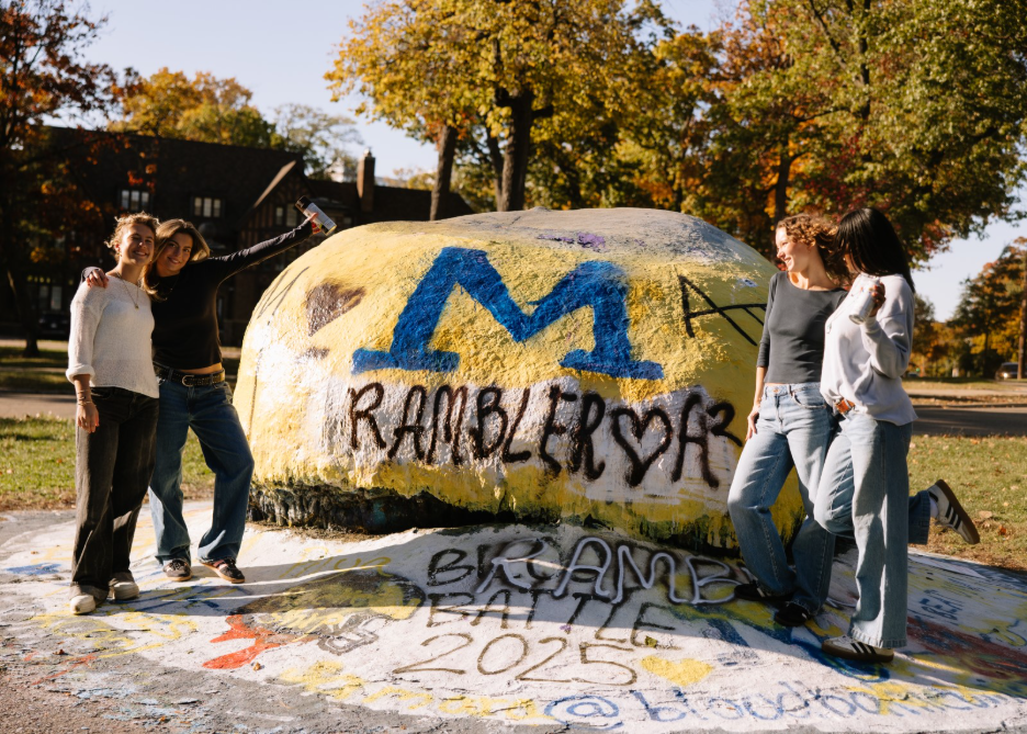 University of Michigan painting the Rock, a campus tradition in Ann Arbor.  