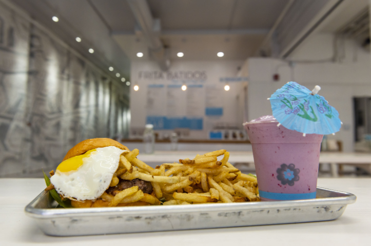 Image of a burger and beverage offered at Frita Batido’s in Ann Arbor.