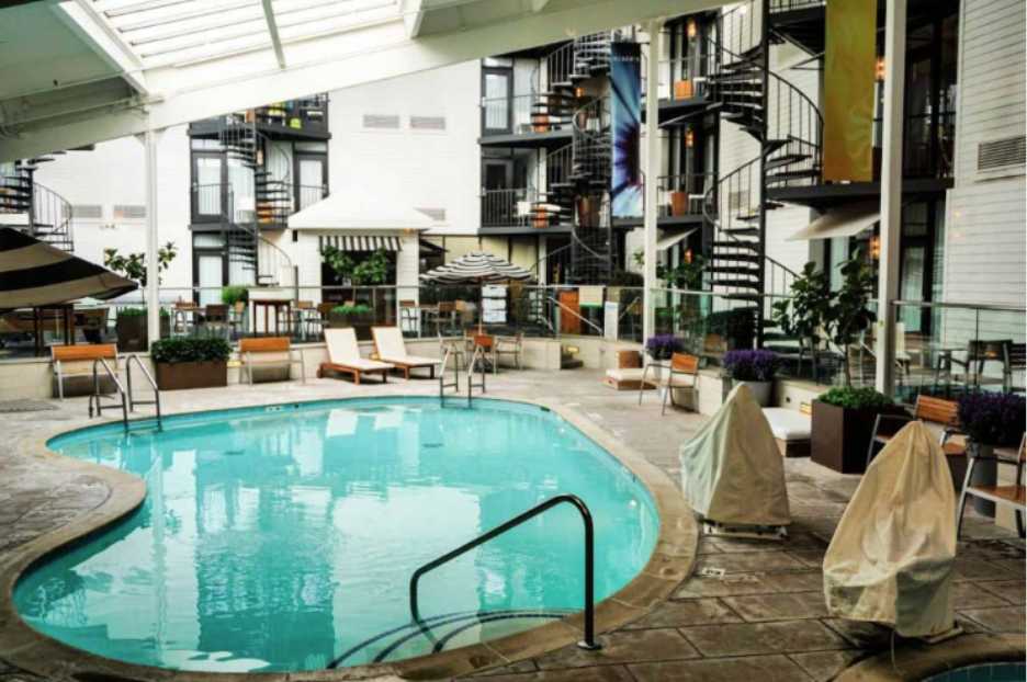 Outdoor pool and amenities at Weber’s Boutique Hotel in Ann Arbor. 