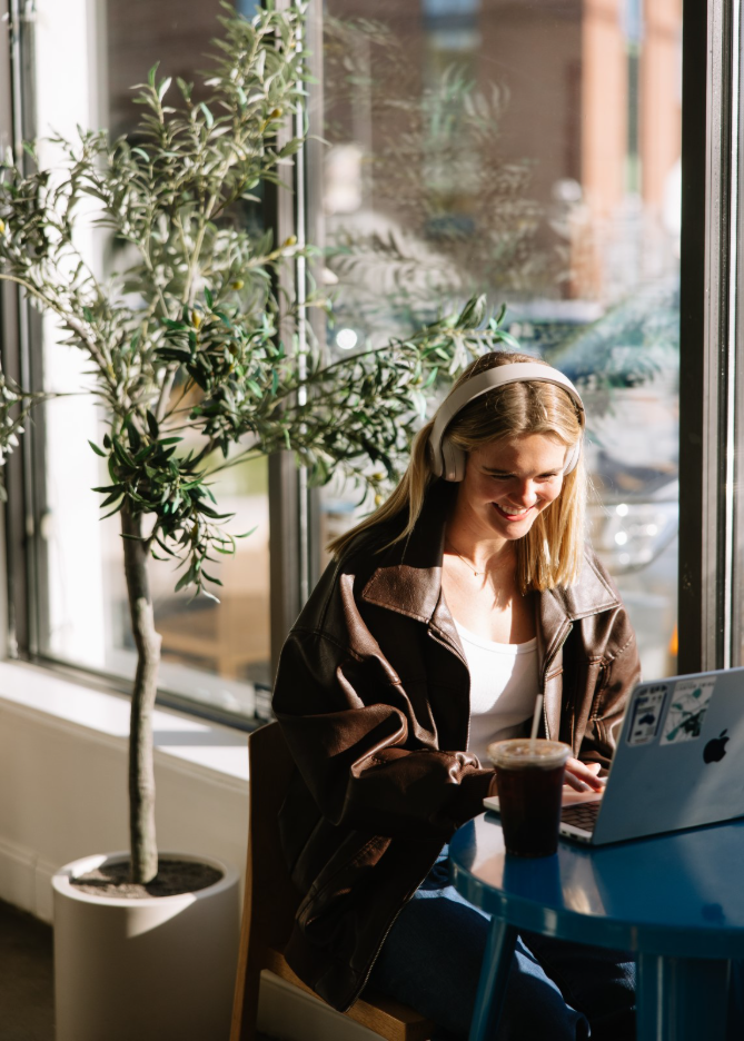 A University of Michigan student studying at a coffee shop in Ann Arbor.
