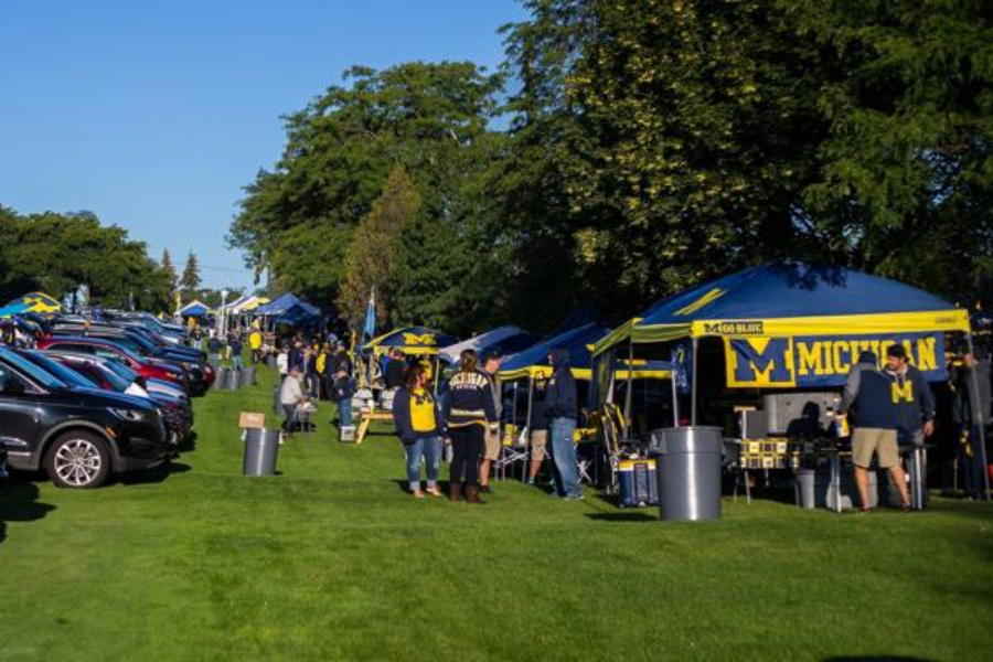 Tailgaters gathered near the University of Michigan Golf Course before a football game. 