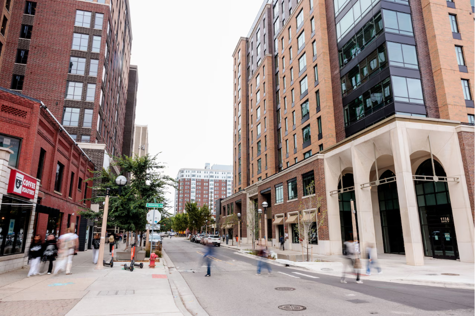 Students walking along South University Avenue near the University of Michigan. 