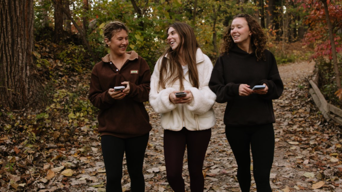 University of Michigan students walk the trail together in Ann Arbor. 