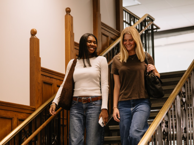 University of Michigan roommates walking through the Michigan Union on Central Campus.