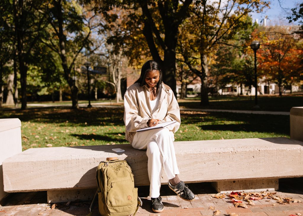 A University of Michigan student work on Central Campus in Ann Arbor.