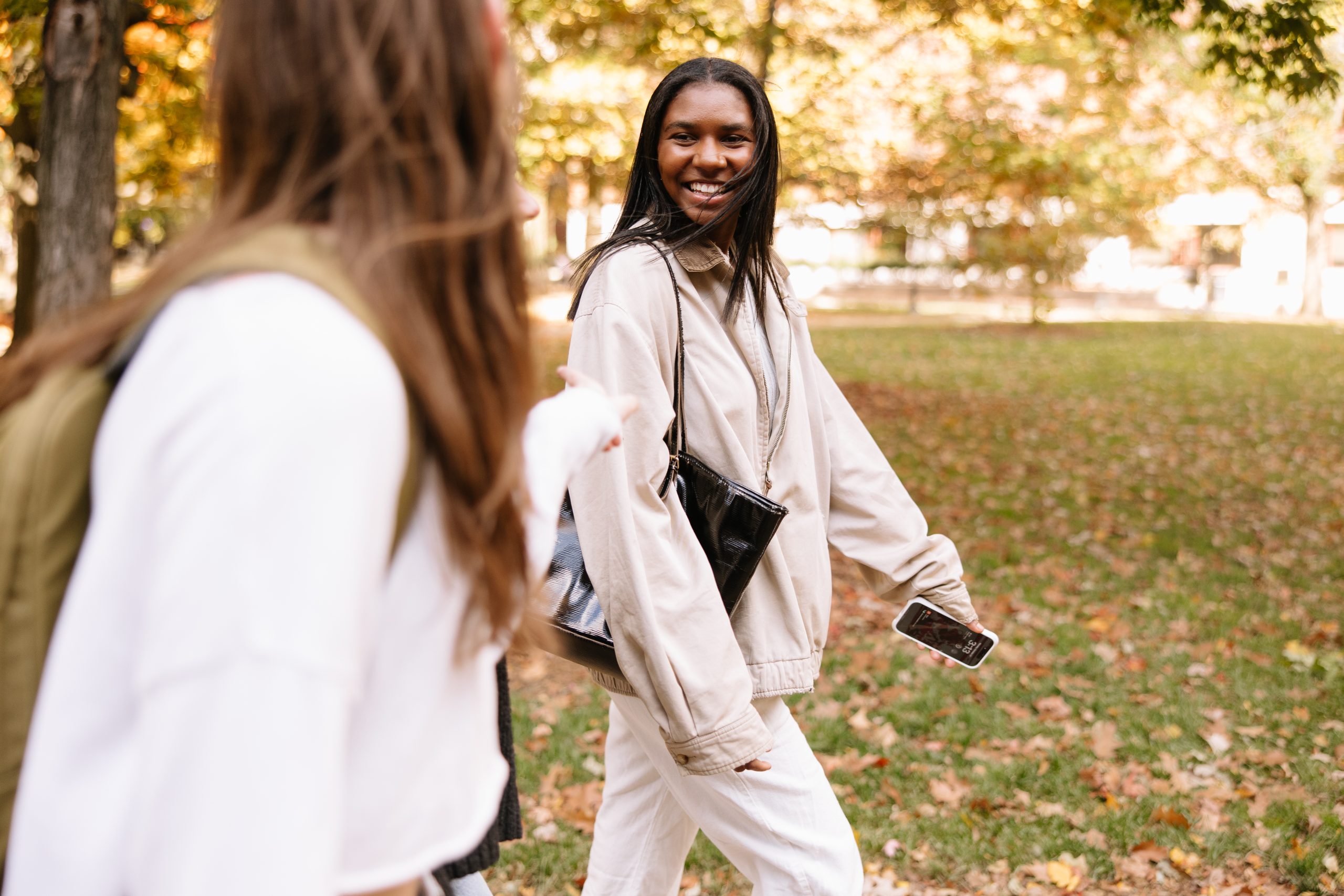 Two UMich students walking around campus in Ann Arbor.
