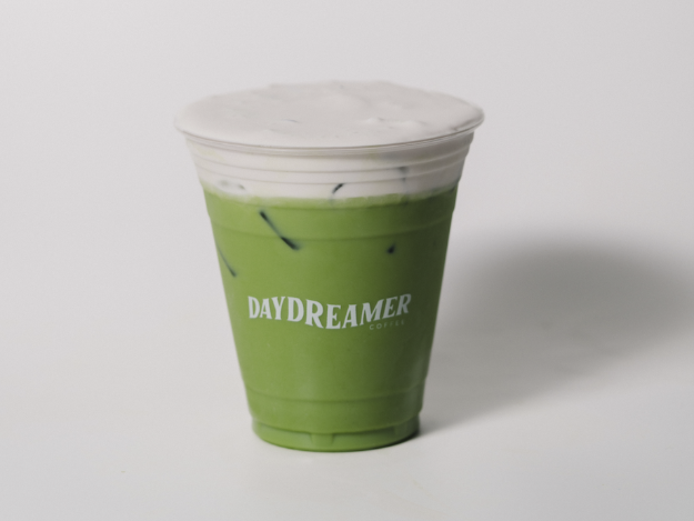 A matcha with cold foam on top from Daydreamer Coffee inside Rambler Ann Arbor. 