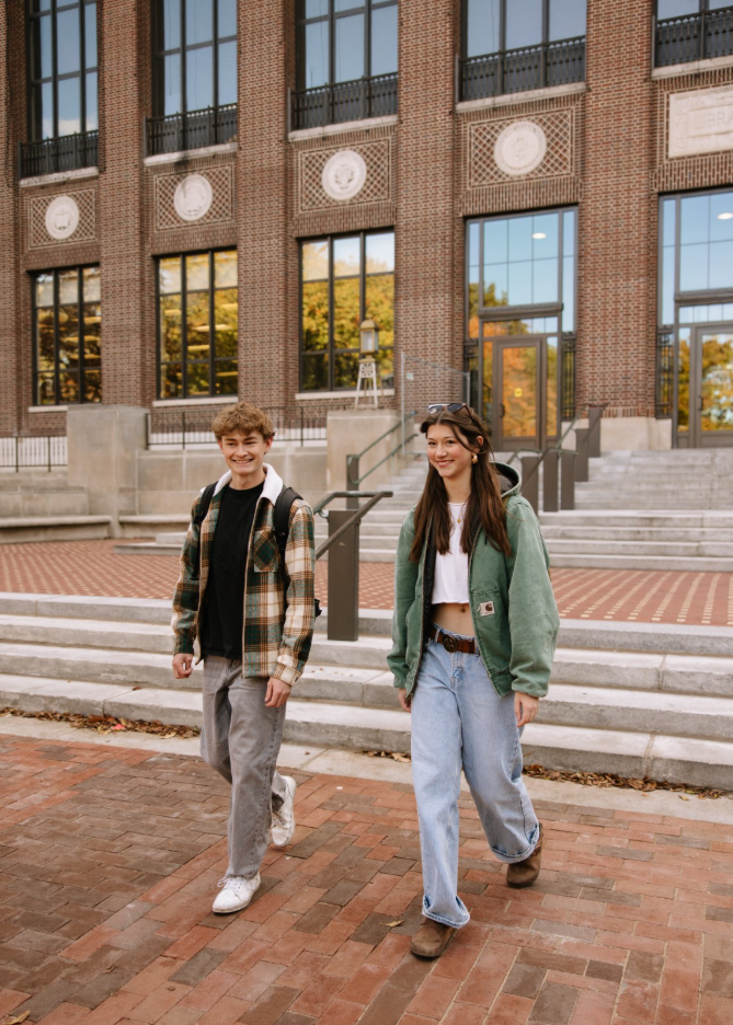 Two UMich students walking through the Diag on Central Campus in Ann Arbor.